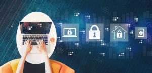 Cyber security with person using a laptop on a white table