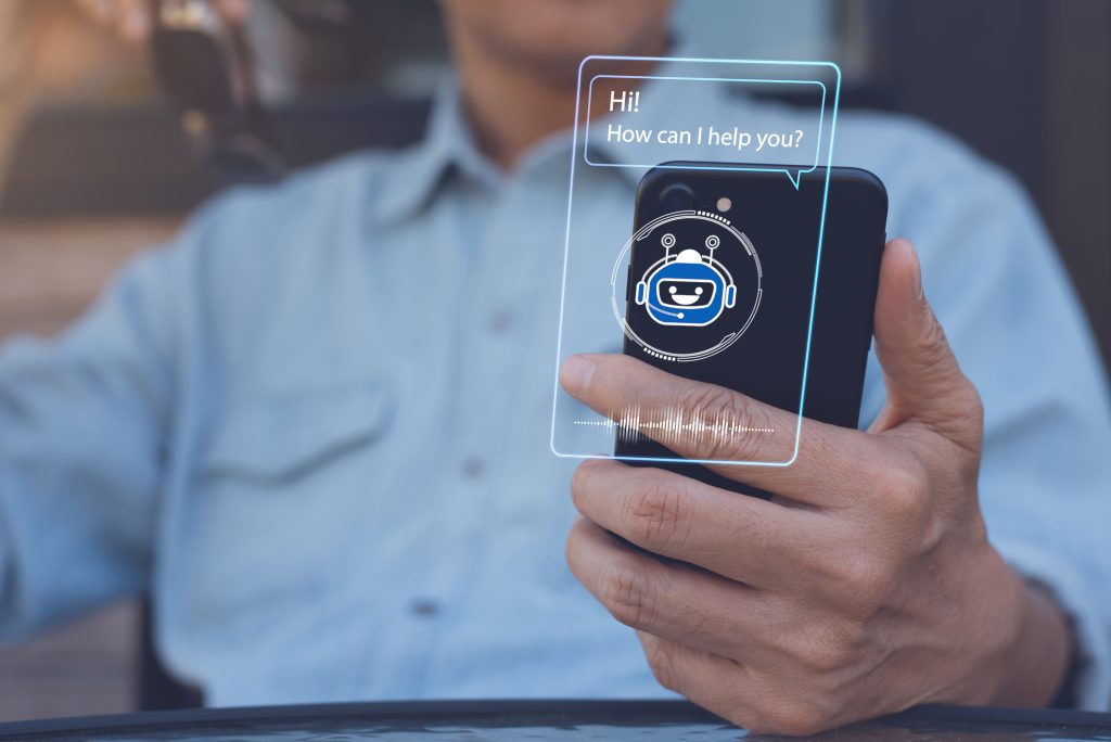 Chatbot assistant conversation, Ai Artificial Intelligence technology concept. Casual man chatting with chatbot via mobile smart phone application on virtual screen