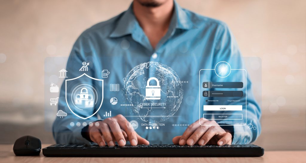 Businessman holding shield protect icon. Protection network security computer and safe your data concept, lock symbol, concept about security, cybersecurity and protection against dangers.